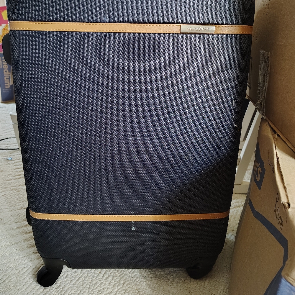 Medium size checked luggage